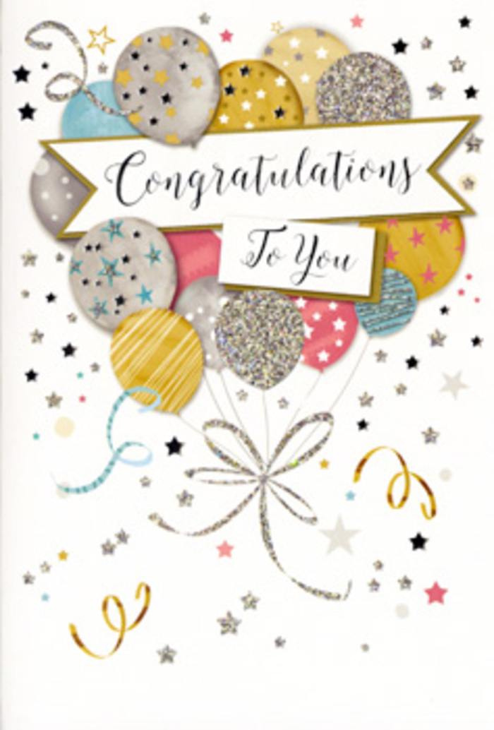 The card in the photograph is a vision of understated festivity, designed to convey congratulations with grace and charm. Dominating the front cover, a cluster of balloons appears almost like a modern floral arrangement, each shape carefully layered to create depth and softness. The palette is composed of champagne gold, silvery grey, creamy beige, airy sky blue, dusty pink, and pale slate, lending a calm yet celebratory feel. Some balloons are scattered with miniature star motifs, others are detailed with slender stripes or a suggestion of glittering texture, as if tiny flecks of foil had been carefully applied. From their rounded bases, long ribbons in metallic tones tumble down in looping curls, converging at the bottom in a tidy knot that visually holds the composition together. The background is a light, neutral cream, sprinkled with small stars, dots, and curly flourishes that resemble confetti drifting gently through the air after a toast at a family gathering in Watford or a celebration dinner near the High Street. Spanning the centre of the card, a smooth, gently curved banner carries the inscription Congratulations To You in graceful, calligraphic lettering, each stroke steady and confident. As someone used to pairing cards with fresh bouquets for customers across Watford-from celebrations near Watford General Hospital to joyous housewarmings in Nascot Wood-the card's atmosphere feels warmly familiar. It suggests pride without pomp, joy without excess, making it ideal to accompany flowers delivered for graduations, promotions, or personal achievements anywhere throughout Watford and the surrounding neighbourhoods.