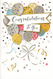 In the image, a single congratulations card is shown upright, its design turning the front cover into a softly sparkling celebration. A bouquet-like cluster of illustrated balloons rises at the centre, overlapping with an easy, organic rhythm. The colours are tastefully chosen: muted golds and silvers, champagne and cream, gentle sky blue, blush pink, and a soft dove grey. Each balloon carries its own subtle decoration, from tiny scattered stars to slim stripes and delicate glitter-style highlights that add a sense of metallic sheen without overpowering the eye. Slender ribbons stream down from the base of the balloons in loose curls of gold and silver, linking together in a neat knot reminiscent of the way we tie off the stems of a hand-tied bouquet at Watford Flowers. The background is a warm, pale tone, lightly dusted with star shapes, dots, and swirling lines that resemble confetti and air currents, as if the balloons were floating quietly in a room after the cheers have subsided. Across the middle, a flowing banner carries the message Congratulations To You in elegant script, the letters curved and connected in a way that feels both modern and timeless. The overall impression is one of gentle, sincere celebration, perfectly suited to accompany a floral gift for exam results, new jobs, or personal milestones around Watford-whether the flowers are being delivered to a home near Cassiobury Park, an office along Clarendon Road, or a cosy gathering spot close to the town centre.
